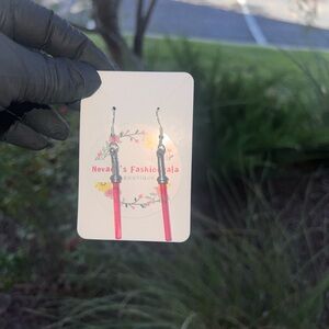 Pink Lego lightsaber with grey handle earrings